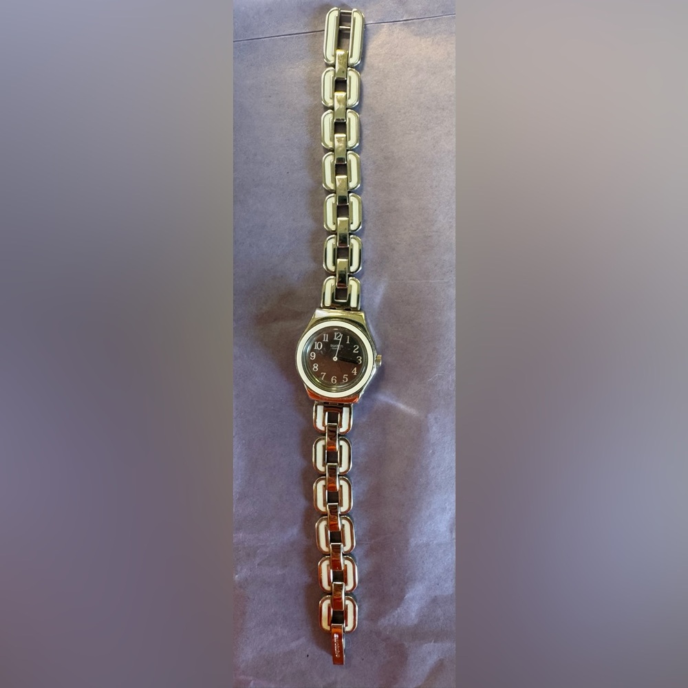 Swatch Silver-Tone Metal Watch Back with silver and white accents.
